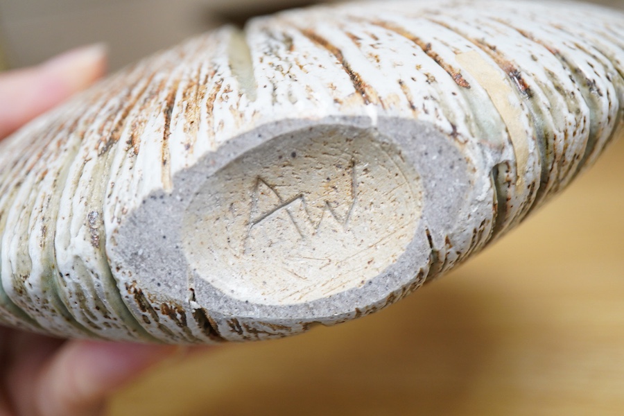 Alan Wallwork (1931-2012), studio pottery textured split oval vase, initialled to the base, 19cm high